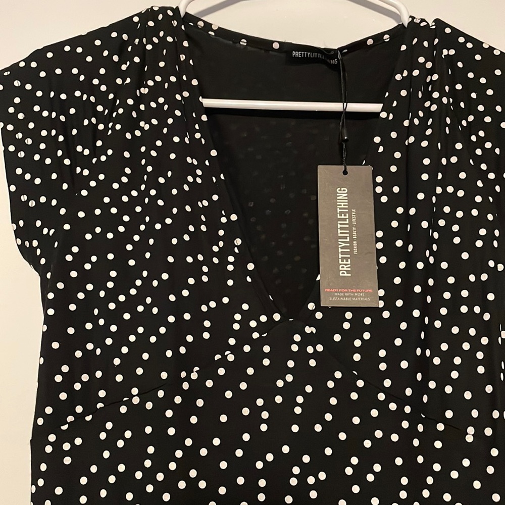 Classic polka dot dress! Soft and stretchy material! Cute to dress up or down.